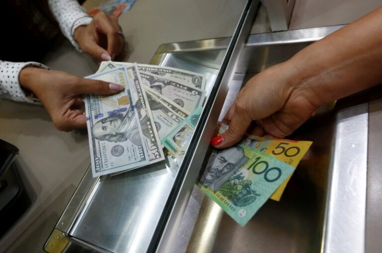 ‘Doom Loop’ of Debt Threatens to Drag Down Australian Dollar By Bloomberg